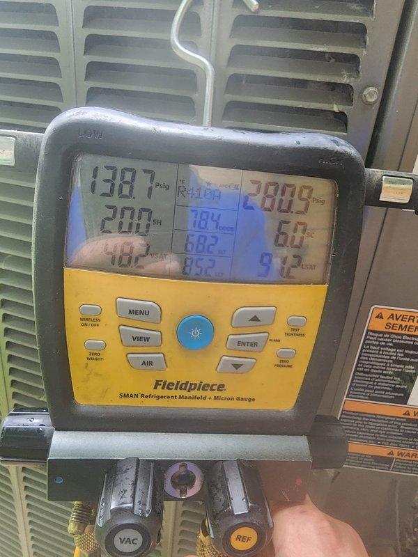 Responded to no cooling complaint on 11-year-old air conditioning system. Upon arrival, verified unit was blowing warm air with no cooling capacity. Performed diagnostic testing using refrigerant manifold and micron gauge to assess system pressures and temperatures. Checked thermostat wiring connections and verified proper terminal connections for all low-voltage wires including compressor, fan, and common circuits. Identified system performance issues consistent with age-related wear on outdoor unit components. Advised customer of need for Lennox Media Filter Merv 16 (X6672, X6675) replacement to maintain proper airflow and system efficiency.