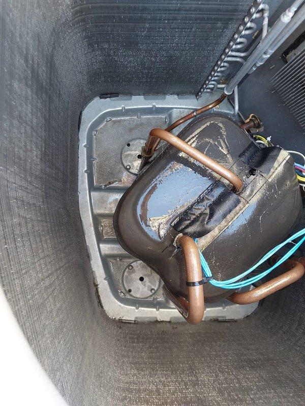 Completed scheduled AC maintenance on residential air conditioning system. Performed comprehensive inspection of outdoor condenser unit, noting moderate dust and debris accumulation between evaporator coil fins. Inspected indoor air handler components including copper refrigerant lines, drain pan, and coil assembly. Drain pan showed normal water presence with minor mineral deposits consistent with regular operation. All refrigerant lines and connections were visually inspected and found secure with typical oxidation patina. System components operational and functioning within normal parameters.