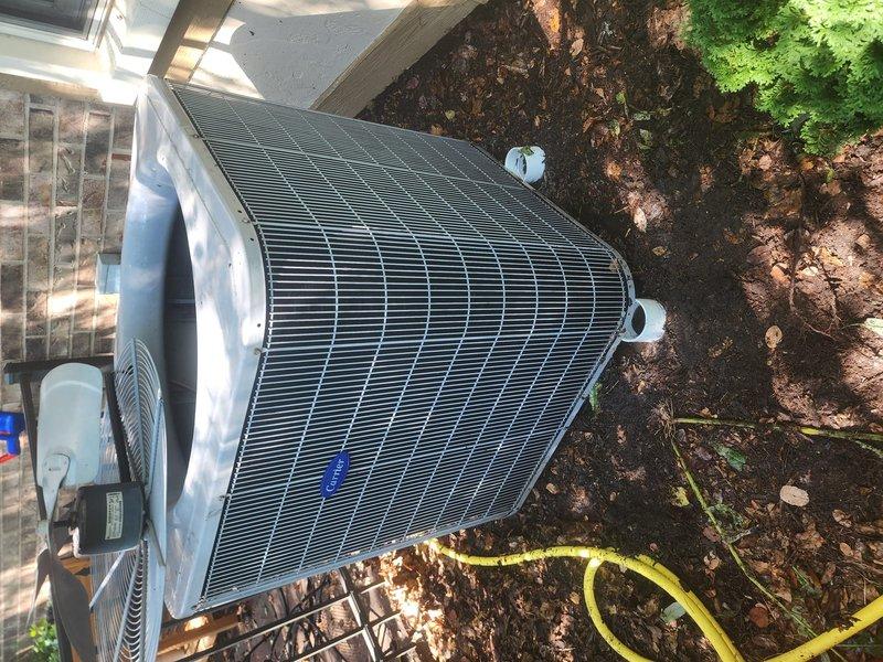 Completed annual HVAC maintenance tune-up on residential cooling system. Inspected outdoor condenser unit and verified system operational status. Checked refrigerant levels following previous year's service where refrigerant and UV dye were added to identify potential leak. Confirmed refrigerant charge within manufacturer specifications with no evidence of leakage detected. Performed comprehensive preventive maintenance including inspection of condenser coil, fan motor operation, electrical connections, and overall unit condition. System tested and operating properly with no issues found.