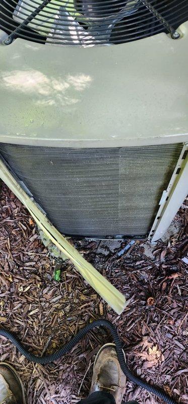 Completed comprehensive spring maintenance tune-up on residential air conditioning system as part of prepaid annual maintenance agreement. Performed thorough inspection of outdoor condensing unit, including condenser coil cleaning to remove accumulated dirt and debris buildup between fins, fan motor and blade inspection, and verification of proper refrigerant levels. Inspected interior blower assembly and mounting components, noting dust accumulation on mounting bracket and heat exchange surfaces. System tested and confirmed operational with all components functioning within normal parameters. Unit restored to optimal cooling efficiency for the upcoming season.
