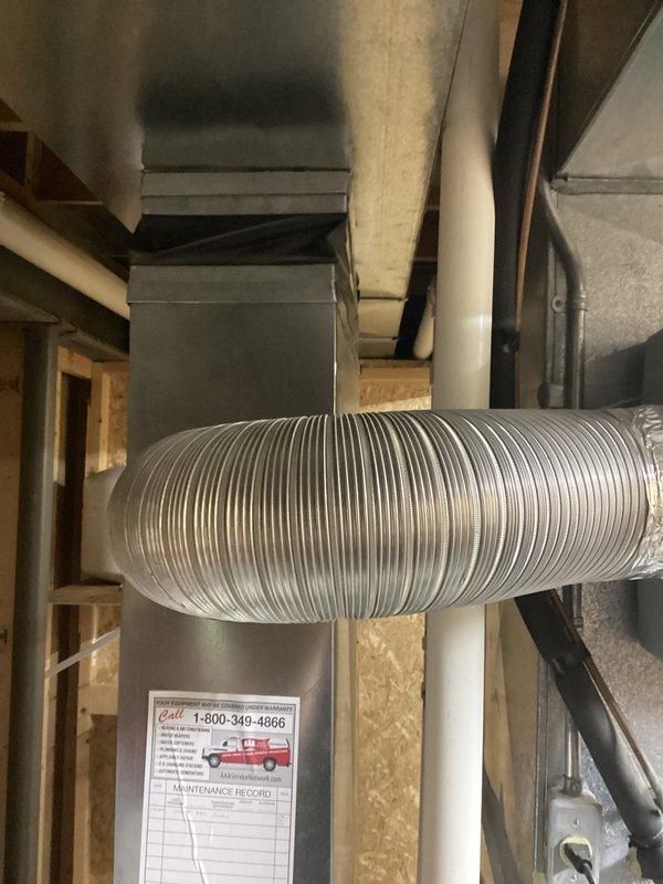 Responded to service call for non-operational central air conditioning system blowing warm air with outdoor fan unit not running. Performed comprehensive system evaluation and documented existing HVAC infrastructure including flexible ductwork installation and mechanical room configuration. Assessed equipment condition to determine repair viability versus full system replacement options and provided homeowner with detailed estimate covering both repair solutions and complete system replacement alternatives.