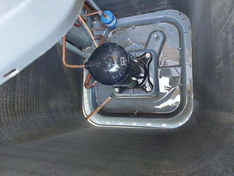 Completed comprehensive cooling maintenance service on residential air conditioning system. Inspected outdoor condenser unit and internal compressor assembly, verifying proper refrigerant line connections and service port accessibility. Provided estimate for installation of soft start kit model 11-1 to reduce compressor startup amperage and extend equipment lifespan.