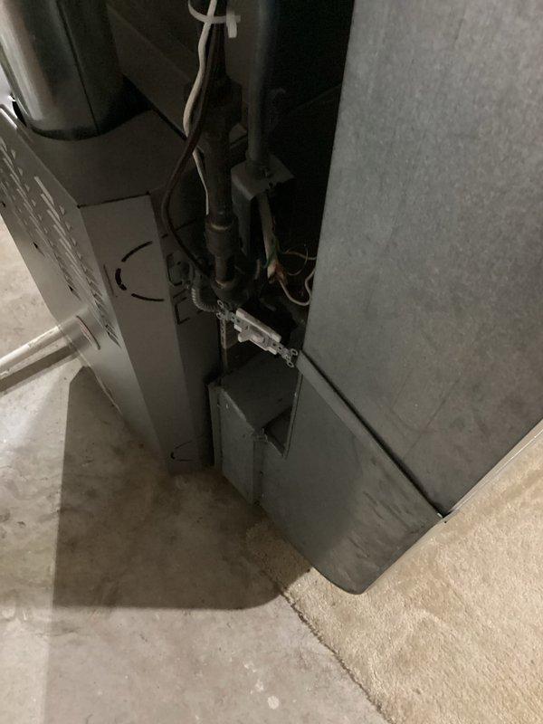 Conducted comprehensive assessment of 21-year-old residential HVAC system for full replacement estimate. Evaluated existing furnace located in basement utility area and outdoor air conditioning condenser unit mounted on exterior wall with vinyl siding. Inspected current equipment operation, ductwork configuration, electrical service connections, gas line routing, and condensate drainage systems. Documented equipment specifications, measured installation clearances, photographed existing system components and exterior mounting locations. Assessed structural considerations for new equipment placement including floor space, ventilation requirements, and utility meter proximity. Provided homeowner with detailed replacement options for matched furnace and air conditioning system to address equipment age and improve energy efficiency.