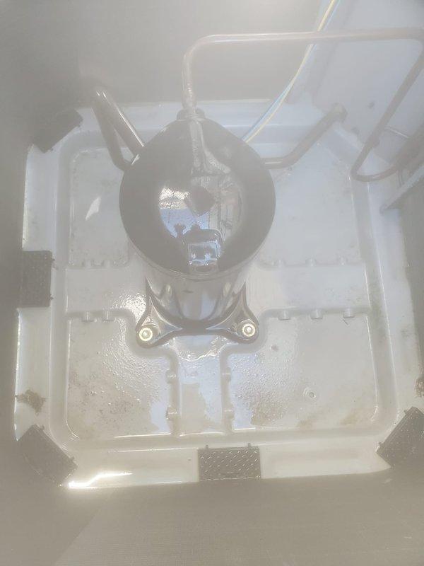 Performed preventative maintenance on Carrier 5-7 ton outdoor condensing unit. Inspected condenser coil, fan assembly, and refrigerant lines for proper operation. Verified condensate drain pan and drainage system functioning correctly with clear discharge line. Unit operating within normal parameters upon completion of tune-up.