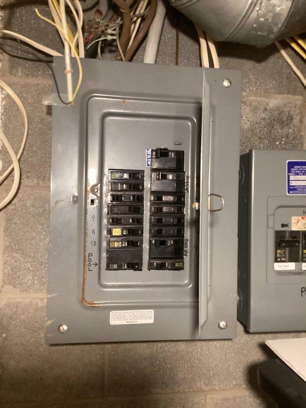 Completed electrical estimate for residential backup generator installation. Assessed existing electrical panel in basement utility area, documenting current breaker configuration and available capacity for generator interconnection. Evaluated exterior location on deck area adjacent to brick wall, identifying suitable mounting position for generator unit and transfer switch with access to existing electrical service panel and outdoor disconnect box.