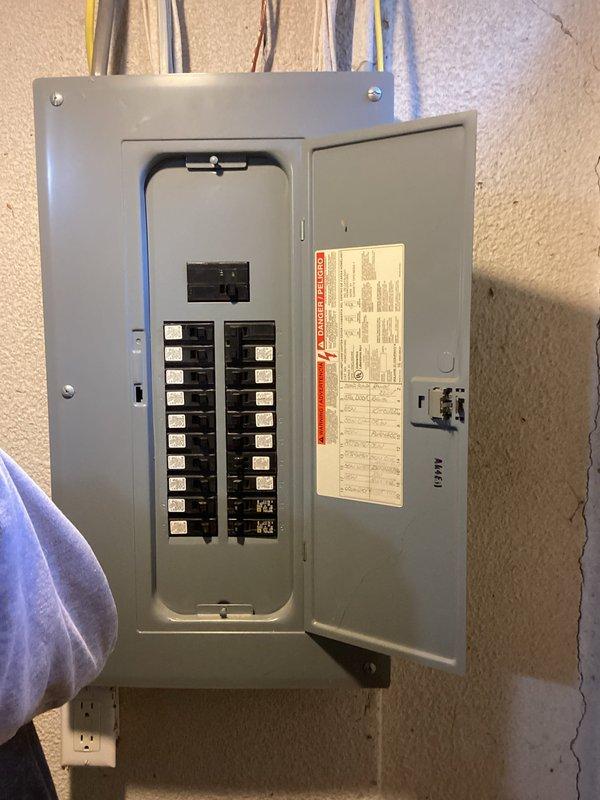 Responded to service call for AC unit not cooling and only circulating air with house temperature at 75°F. Upon arrival, inspected 30-year-old air conditioning system located in basement mechanical room. Evaluated existing furnace and HVAC infrastructure, including ductwork, condensate drainage system, and electrical connections. Assessed electrical panel and circuit breaker configuration serving the HVAC equipment. Given the age of the unit and lack of cooling performance, provided comprehensive estimate for complete AC system replacement, including discussion of modern high-efficiency equipment options, proper sizing requirements, and installation considerations for basement location.