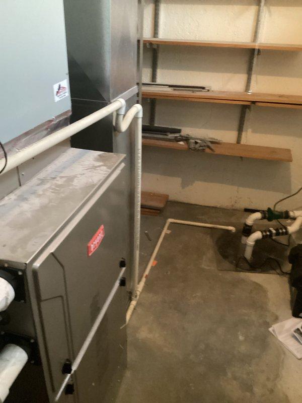 Completed comprehensive assessment of existing HVAC system for replacement estimate. Evaluated current furnace/air handler unit in basement mechanical room, documented equipment age and condition, photographed existing installation including ductwork connections, condensate drainage lines, and electrical service. Assessed spatial constraints and existing infrastructure to determine optimal replacement equipment specifications and installation requirements.