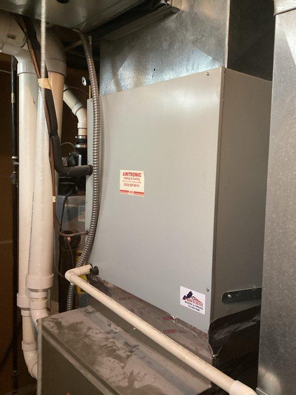 Completed comprehensive assessment of existing HVAC system for replacement estimate. Evaluated current furnace/air handler unit in basement mechanical room, documented equipment age and condition, photographed existing installation including ductwork connections, condensate drainage lines, and electrical service. Assessed spatial constraints and existing infrastructure to determine optimal replacement equipment specifications and installation requirements.