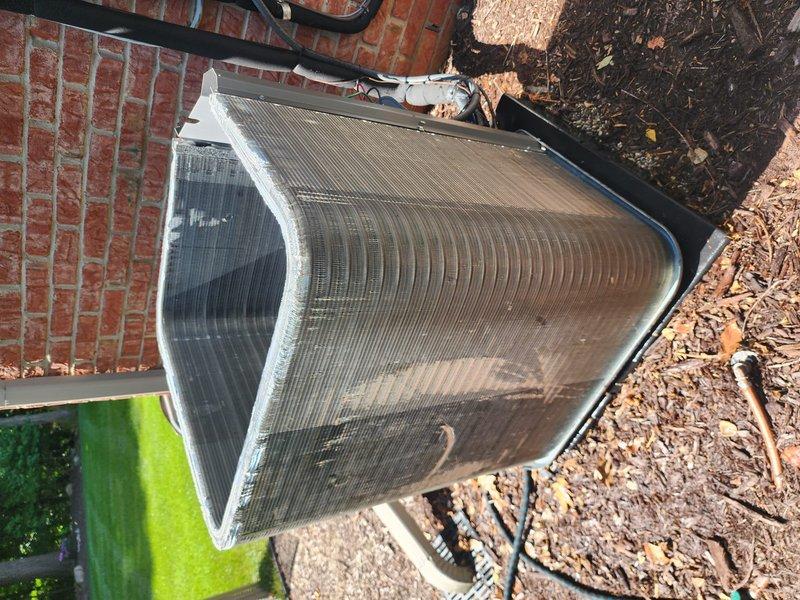 Completed annual preventive maintenance on two residential air conditioning systems, both approximately five years old and located on the north side of the property. Performed comprehensive tune-up procedures on both outdoor condenser units, which included inspecting electrical connections, checking refrigerant levels, cleaning condenser coils, verifying proper airflow through mesh panels, and testing system operation. Both units showed normal wear consistent with age and outdoor exposure, with minor debris accumulation around the bases that was cleared. All components tested within normal operating parameters, and both systems are functioning properly with no issues identified.