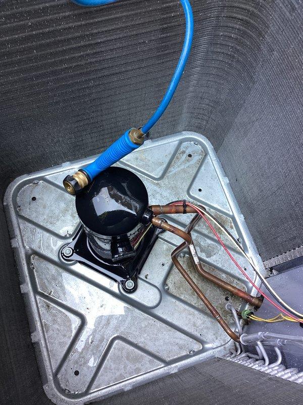 Responded to service call for non-operational AC unit with fan failure on system installed in January 2025. Upon inspection, found condenser coil heavily clogged with dirt, dust, and debris causing restricted airflow and preventing proper system operation. Performed thorough coil cleaning using pressurized water to remove accumulated contaminants from aluminum fins and restore airflow capacity. Verified refrigerant line connections, electrical wiring, and mounting hardware were secure and properly installed. System tested and confirmed operational following cleaning procedure.