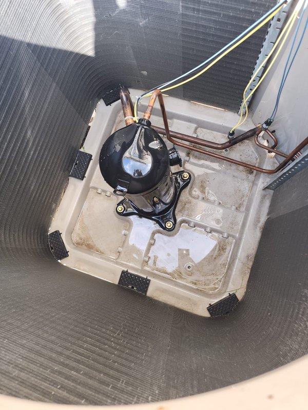 Completed comprehensive preventive maintenance on residential air conditioning system under prepaid service agreement. Performed standard AC tune-up protocol including inspection of outdoor condensing unit, compressor assembly, and refrigerant lines. Condenser coil fins showed moderate accumulation of dirt and debris, which is typical for outdoor units; cleaned coil surfaces to restore optimal heat transfer efficiency. Inspected compressor with copper refrigerant lines and verified proper connections. Checked condensate drain pan condition and vibration dampeners. All electrical connections and control wiring examined and found secure. System operational and ready for cooling season.