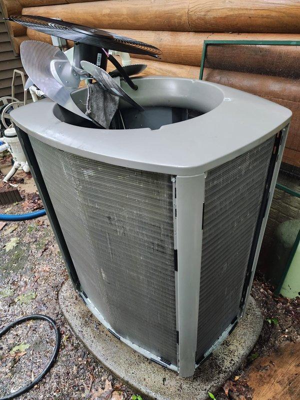 Completed preventive maintenance inspection on residential air conditioning system under Worry Free Service Agreement. Performed comprehensive evaluation of indoor evaporator coil assembly, condensate drain pan, and float switch operation, noting mineral deposits and water staining consistent with normal system operation. Inspected outdoor condenser unit, verified fan motor operation, and assessed overall system performance to ensure optimal cooling efficiency for the season.