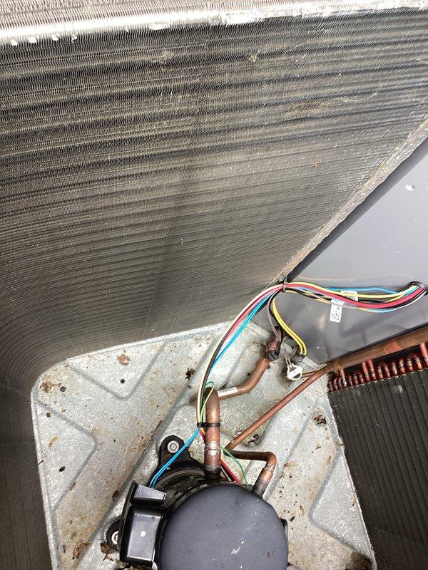 Completed annual tune-up on 4-year-old residential air conditioning system with no reported issues. Performed comprehensive inspection of outdoor condenser unit, verified proper operation of all mechanical and electrical components, and assessed interior evaporator coil condition. System found to be operating within normal parameters and ready for cooling season.