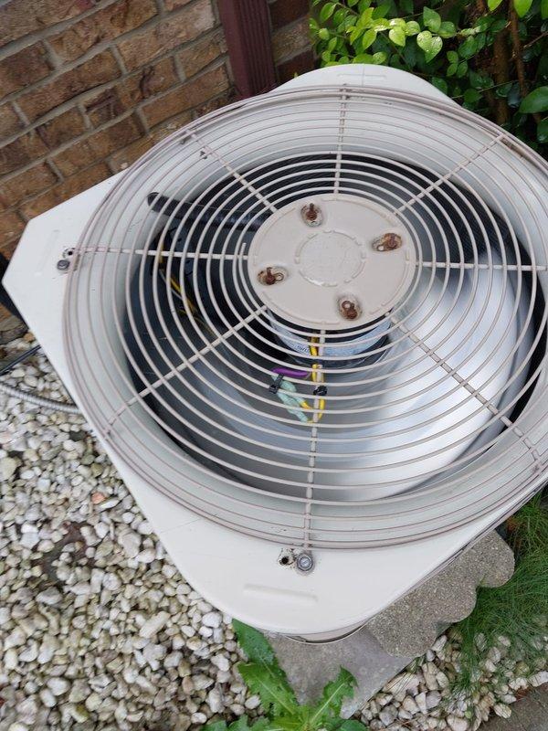 Completed routine cooling season maintenance on residential air conditioning system. Performed comprehensive inspection of outdoor condenser unit, verified proper operation of fan motor and compressor, and documented equipment condition with photographs showing unit in serviceable condition with adequate clearance and proper installation on concrete pad.