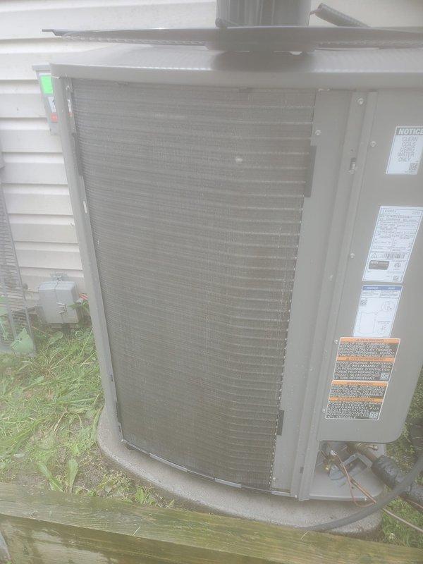 Completed scheduled cooling season maintenance on residential air conditioning system. Performed comprehensive inspection of outdoor condensing unit, verified proper operation of compressor and condenser fan, and checked refrigerant lines for leaks or damage. Inspected and confirmed proper function of condensate drainage system including drain pan and PVC drainage piping in basement utility area.