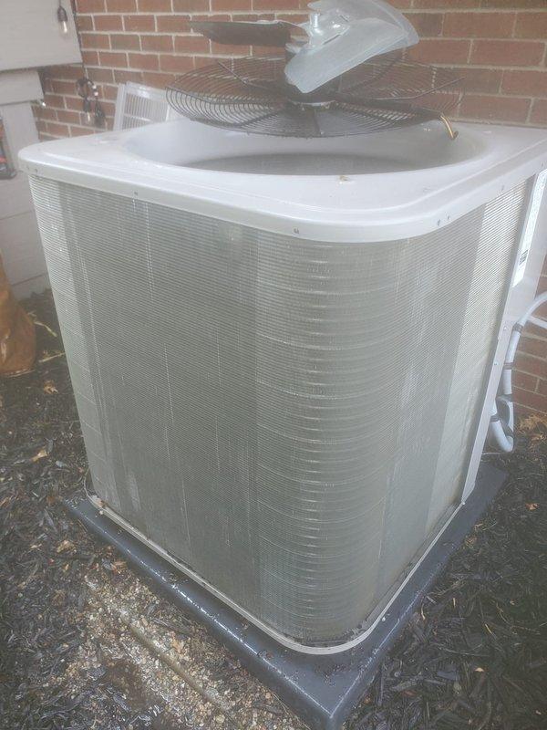 Completed routine cooling system maintenance and tune-up on residential HVAC unit. System inspected and confirmed operational with outdoor condenser unit and indoor components functioning properly. Drain pan showed accumulation of debris and particulate matter, which was addressed during service to ensure proper condensate drainage and prevent potential clogs.