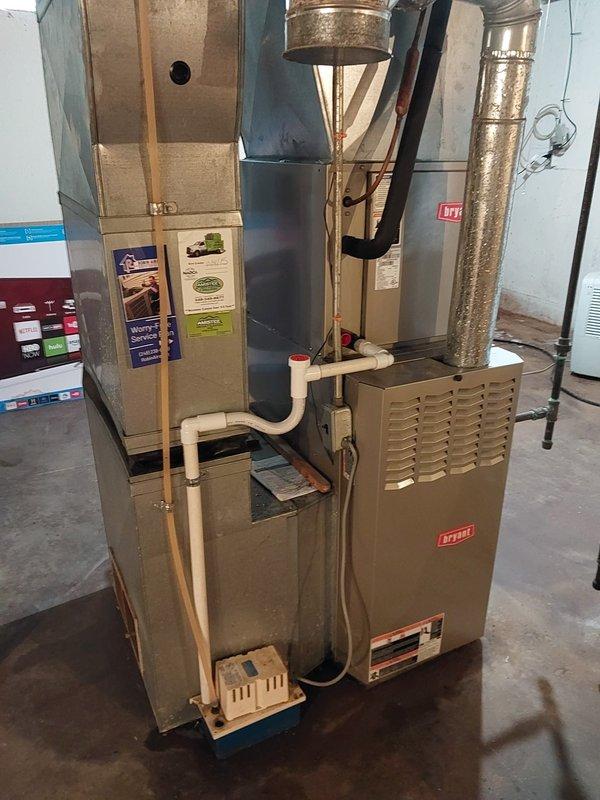 Responded to no cooling complaint on 8-year-old Bryant system. Upon arrival, connected refrigerant manifold gauges to measure system pressures and temperatures. Diagnostic readings showed suction pressure of 7.06 PSIG and discharge pressure of 143.8 PSIG, with superheat at 14.5°F and subcooling at 13.4°F, indicating low refrigerant charge. System was undercharged, preventing proper cooling capacity and causing compressor to run continuously without achieving desired temperature setpoint. Identified refrigerant loss as root cause of no cooling condition and advised customer of findings for necessary repairs.