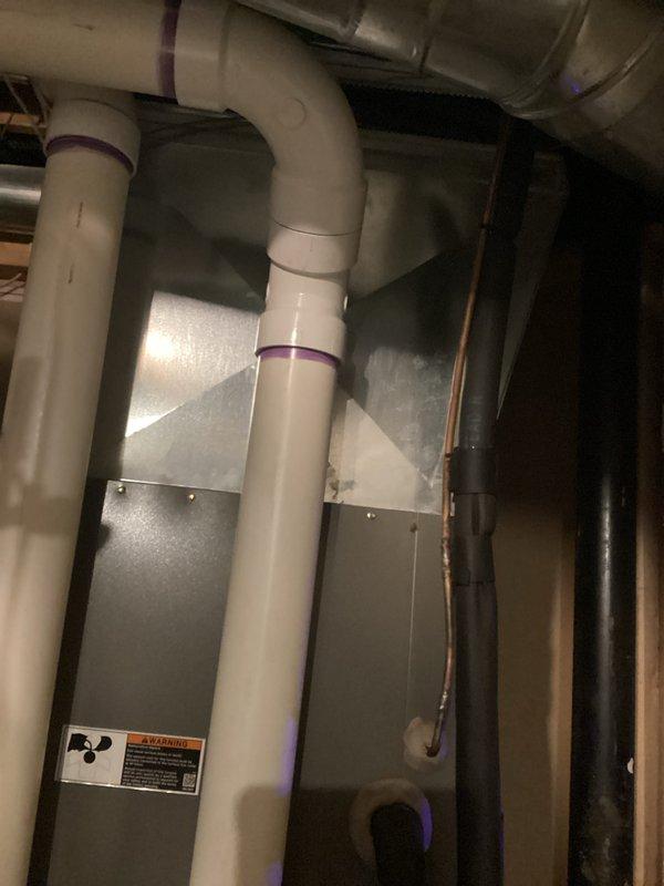 Provided estimate for complete air conditioning system replacement after unit failure caused by electrical brownout. The 12-year-old existing system sustained damage from power surge and is non-operational. Assessed current Lennox HVAC installation in basement mechanical room, including existing furnace, ductwork configuration, and condensate drainage system to determine proper replacement specifications and compatibility requirements.
