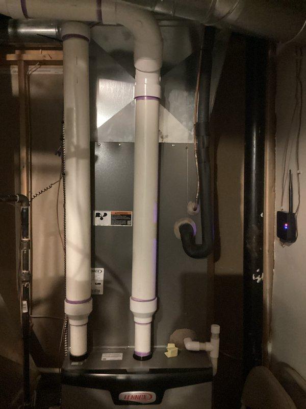 Provided estimate for complete air conditioning system replacement after unit failure caused by electrical brownout. The 12-year-old existing system sustained damage from power surge and is non-operational. Assessed current Lennox HVAC installation in basement mechanical room, including existing furnace, ductwork configuration, and condensate drainage system to determine proper replacement specifications and compatibility requirements.