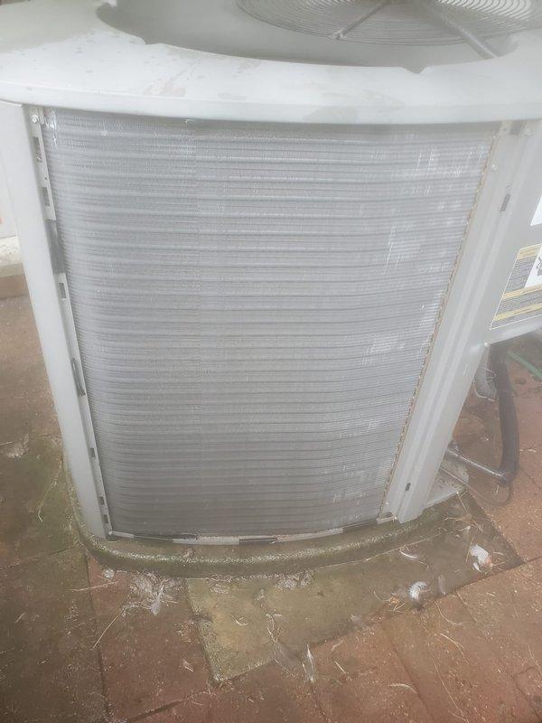 Completed scheduled AC maintenance visit 3-5 on residential HVAC system. Performed comprehensive inspection of air handler unit located in mechanical space, including examination of evaporator coil and blower assembly. Documented current condition of equipment with detailed photographs showing heat exchanger coil with horizontal metallic fins and surrounding components. Noted visible dust accumulation on floor surfaces around unit base and refrigerant line routing. Inspected condensate drainage system and refrigerant lines for proper operation. All components found functioning within normal parameters during this prepaid maintenance visit.