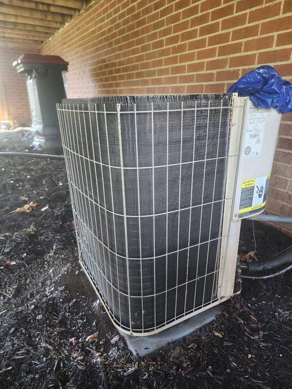 Completed routine cooling system tune-up and maintenance on residential HVAC unit. System was operational upon arrival and confirmed to be working properly. Performed comprehensive inspection of outdoor condensing unit, which was found in functional condition with protective wire guard cage intact. Inspected condenser coils and fins, checking for proper airflow and heat exchange capability. Evaluated condensate drainage system and verified proper operation of condensate pump assembly. All components tested and confirmed operational with no repairs required at this time.
