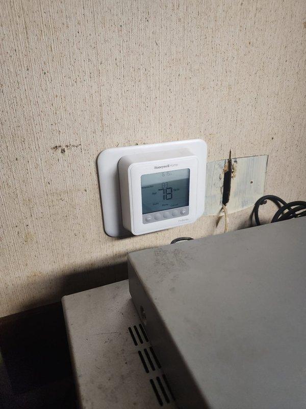 Completed installation of Alta boiler system in basement mechanical room with full hydronic piping connections and electrical integration. Installed two Honeywell T6 digital thermostats for multi-zone temperature control, with proper wiring and commissioning. All copper plumbing connections, control valves, and manifold assemblies were secured and tested for proper operation. System was energized, pressurized, and verified for safe operation with all safety controls functioning as designed.