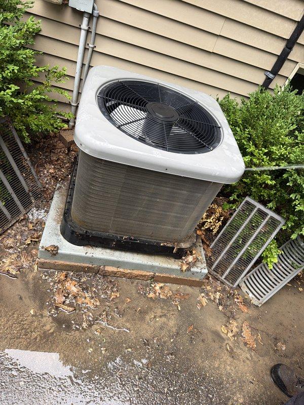 Completed comprehensive AC maintenance and tune-up on outdoor condensing unit. Performed system inspection with top panel removed to access internal components, checked compressor assembly and electrical connections, and verified proper fan operation. Unit reassembled and confirmed operational upon completion.