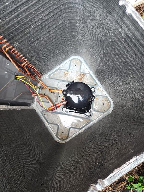 Completed seasonal AC tune-up on 4-year-old outdoor condensing unit as part of prepaid maintenance plan. Performed comprehensive inspection of condenser coil, compressor, capacitor, refrigerant lines, and electrical connections. Unit showed normal wear with minor rust staining on mounting bracket but no operational issues identified. Condenser fins intact with horizontal ridges in good condition. Verified proper refrigerant line connections and brazing joints. Checked electrical wiring and conduit routing. Unit operating within normal parameters with no repairs needed at this time.