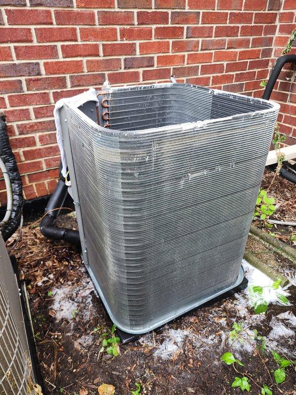 Completed seasonal AC tune-up on 4-year-old outdoor condensing unit as part of prepaid maintenance plan. Performed comprehensive inspection of condenser coil, compressor, capacitor, refrigerant lines, and electrical connections. Unit showed normal wear with minor rust staining on mounting bracket but no operational issues identified. Condenser fins intact with horizontal ridges in good condition. Verified proper refrigerant line connections and brazing joints. Checked electrical wiring and conduit routing. Unit operating within normal parameters with no repairs needed at this time.
