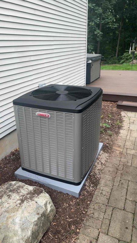 Completed full HVAC system installation including Lennox furnace, air conditioning unit, S40 smart thermostat, and 17-gallon whole-home humidifier. All equipment installed per manufacturer specifications, system tested and operational, with outdoor condenser positioned on concrete pad and all components properly connected and commissioned.