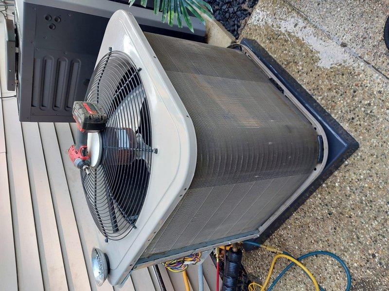 Responded to service call for air conditioning system not cooling properly. Upon inspection, found low refrigerant charge in the system. Connected manifold gauges to measure operating pressures and confirmed undercharge condition. Located and repaired refrigerant leak, then evacuated the system and recharged to manufacturer specifications. Verified proper airflow across condenser coil and checked condensate drainage system for proper operation. System tested and confirmed cooling within normal parameters upon completion.