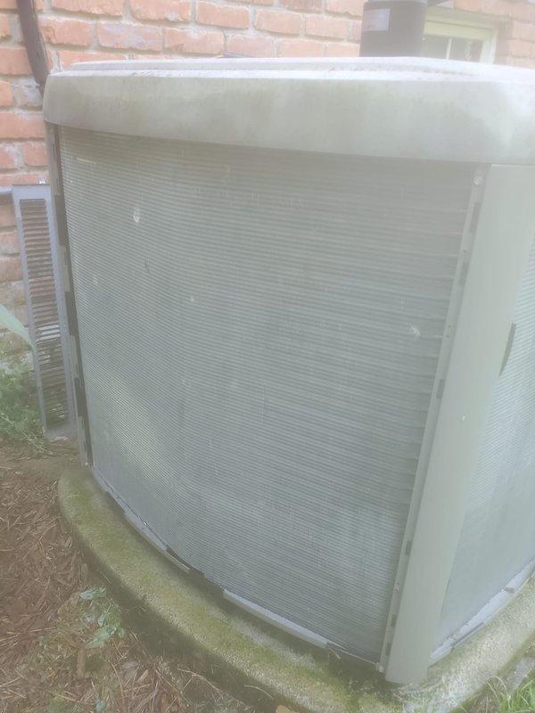 Completed comprehensive AC maintenance on residential condenser unit. Performed standard tune-up procedures including inspection of outdoor unit housing, coils, and refrigerant lines, verified proper condensation on system components indicating normal operation, and confirmed unit functionality. All components found in satisfactory working condition with typical seasonal wear.