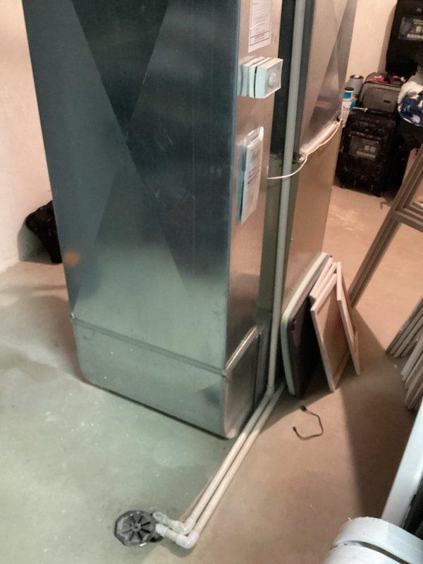 Conducted comprehensive estimate appointment for complete HVAC system replacement at residential property. Evaluated original furnace and air conditioning unit, both currently operational and located in basement. Documented existing equipment configuration including beige furnace with side ventilation grates, wall-mounted humidifier with water line connection, teal-colored air handler cabinet with PVC condensate drain system, and associated ductwork and copper piping. Assessed current system layout, drainage infrastructure, and electrical components. Photographed existing equipment and installation conditions to provide accurate replacement recommendations. Both heating and cooling systems are original to the home with undetermined age, requiring full system upgrade. Provided homeowner with equipment options and installation specifications for furnace and air conditioner replacement.
