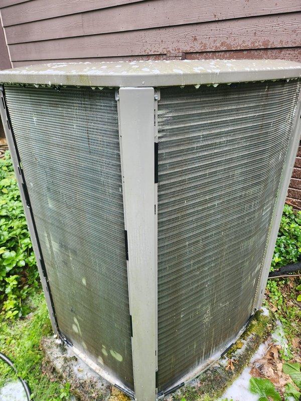 Completed scheduled prepaid maintenance tune-up on residential cooling system. Performed comprehensive inspection of outdoor condenser unit and indoor air handler components. System confirmed operational with normal cooling performance. Documented exterior unit showing weathering and surface discoloration consistent with age, and noted significant rust corrosion on blower motor mounting bracket assembly requiring future attention. All electrical connections inspected and verified secure. Customer advised system currently functioning properly with maintenance contract extending through 2026.