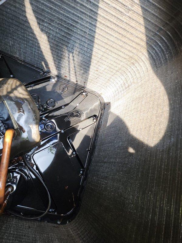 Completed routine cooling season maintenance inspection on residential outdoor AC unit. Performed visual assessment of condenser unit, verified proper placement and clearance, inspected heat exchanger coils and fins for damage or debris accumulation, and confirmed unit housing integrity with no visible defects noted.