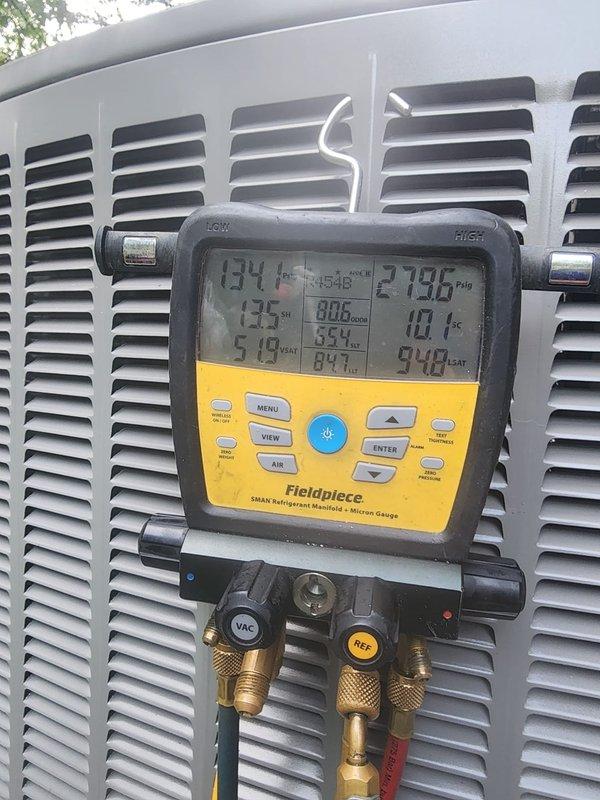 Responded to callback for insufficient cooling with system unable to maintain temperature below 75°F. Performed diagnostic testing using digital manifold gauge to measure refrigerant pressures and temperatures. Inspected insulated refrigerant lines and system components for proper operation. Verified system parameters and documented readings showing suction temperature of 273.6°F during testing sequence.