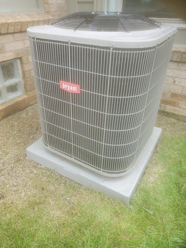 Completed preventive maintenance service on Bryant outdoor condensing unit and indoor air handler system under Worry Free Service Agreement cooling inspection. Unit exterior and coil fins found in good condition with no visible damage; verified proper drainage and checked expansion tank installation with adequate water level in safety pan. All components operating within normal parameters.