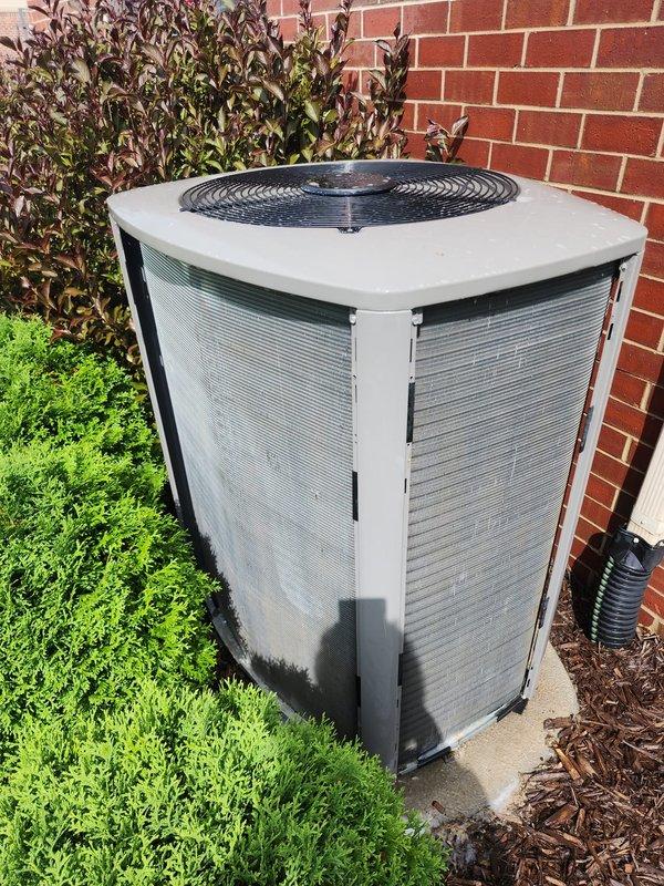 Completed preventative maintenance tune-up on 2-year-old residential air conditioning system with no reported issues. Performed comprehensive inspection of outdoor condenser unit and indoor evaporator coil assembly, documented frost accumulation on refrigerant lines indicating potential airflow restriction or refrigerant charge concern requiring monitoring. System operational at time of service with follow-up scheduled to verify performance.