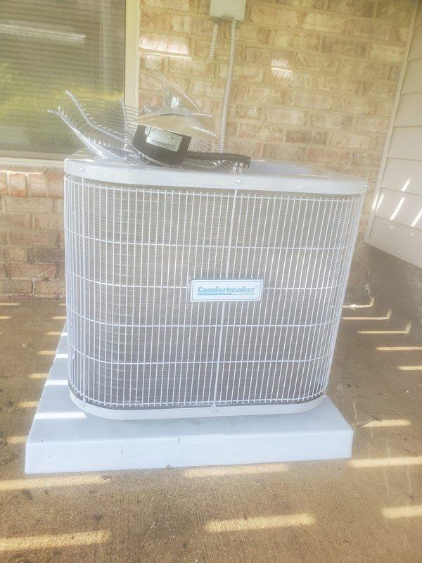 Completed comprehensive air conditioning tune-up and maintenance on ComfortMaker system with condenser unit located on exterior patio pad and air handler in lower level utility room. Performed full system inspection including refrigerant levels, electrical connections, condenser coil cleaning, condensate drain system evaluation, and operational testing of all components. All systems found operating within normal parameters with no deficiencies noted; unit ready for cooling season.