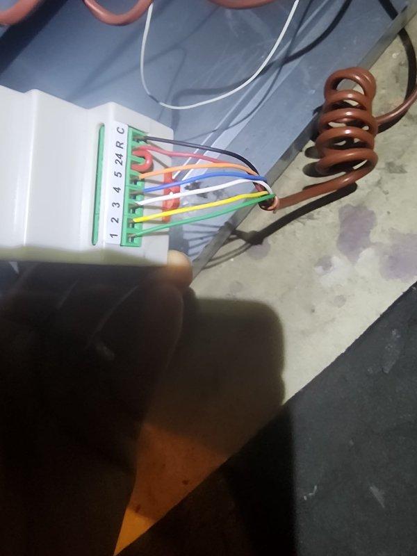 Responded to service call for Lennox central air conditioning system with complete loss of cooling function and flashing red indicator light. Diagnosed faulty sender module in the control system and replaced defective UT-SWM component. Verified proper thermostat wiring connections at terminal block, confirmed all wire terminations were secure, and tested system operation to ensure unit restored to normal cooling function with no error codes present.