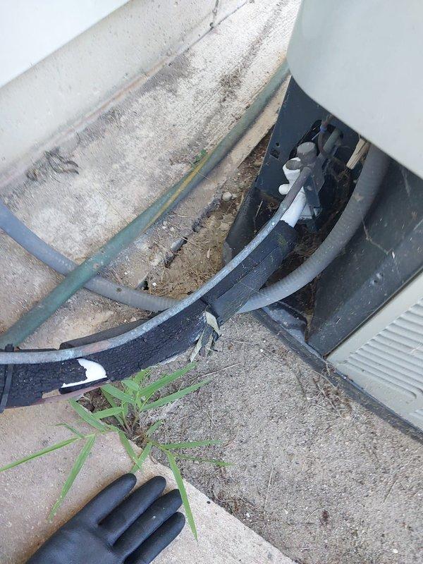 Completed scheduled air conditioning maintenance on outdoor condensing unit. Inspected compressor, refrigerant lines, and heat exchanger coils for proper operation. Noted deteriorated foam pipe insulation on exterior refrigerant lines requiring replacement to maintain energy efficiency and prevent line damage. Coil fins showed normal dust accumulation with minor weathering consistent with outdoor exposure. All mechanical components functioning within normal parameters at time of inspection.