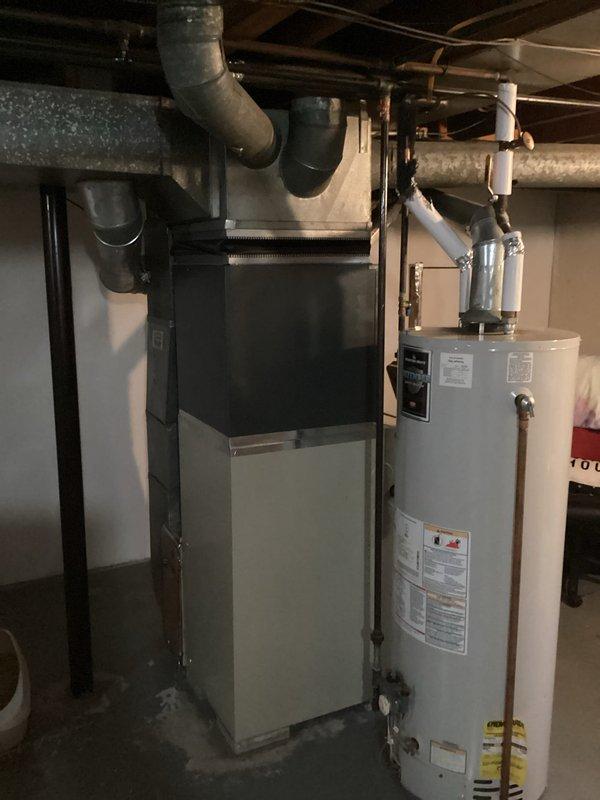 Conducted full system evaluation for non-operational 20-year-old air conditioning system. Customer declined repair options due to age of equipment and requested replacement estimate for complete HVAC system upgrade. Documented existing furnace, air handler, and associated ductwork configuration in basement mechanical room for accurate equipment sizing and installation planning.