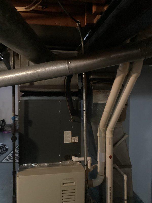Conducted full system evaluation for non-operational 20-year-old air conditioning system. Customer declined repair options due to age of equipment and requested replacement estimate for complete HVAC system upgrade. Documented existing furnace, air handler, and associated ductwork configuration in basement mechanical room for accurate equipment sizing and installation planning.