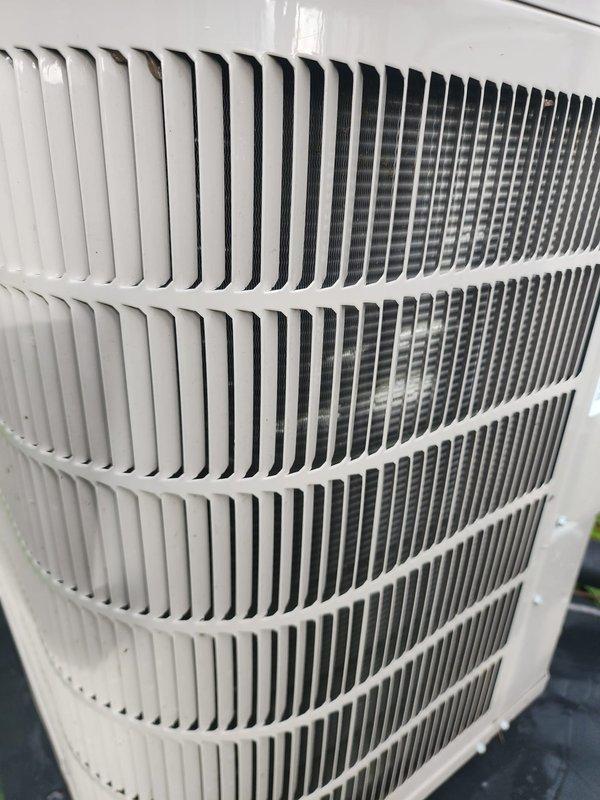 Completed scheduled AC maintenance on split system. Inspected outdoor condensing unit and confirmed proper operation with clean exterior grille and intact condenser coil. Verified indoor air handler installation with refrigerant lines properly insulated and electrical connections secure. All components operating within normal parameters.