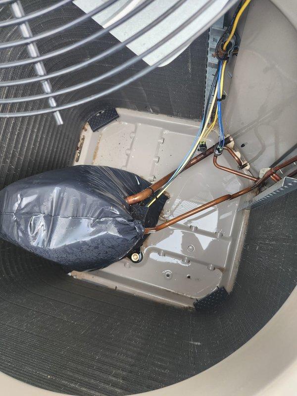 Completed scheduled AC maintenance on split system. Inspected outdoor condensing unit and confirmed proper operation with clean exterior grille and intact condenser coil. Verified indoor air handler installation with refrigerant lines properly insulated and electrical connections secure. All components operating within normal parameters.
