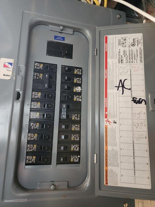 Conducted warranty inspection and documented electrical code violations on HVAC installation. Identified service disconnect clearance deficiency per 2015 MRC E3405.1, E3405.2 and 2023 NEC 110.26, as well as missing bushing or fitting where NMB cable enters flexible metal conduit per 2023 NEC 440.14. Photographed electrical panel, basement installation area, and code violation locations, then completed required follow-up documentation for correction.