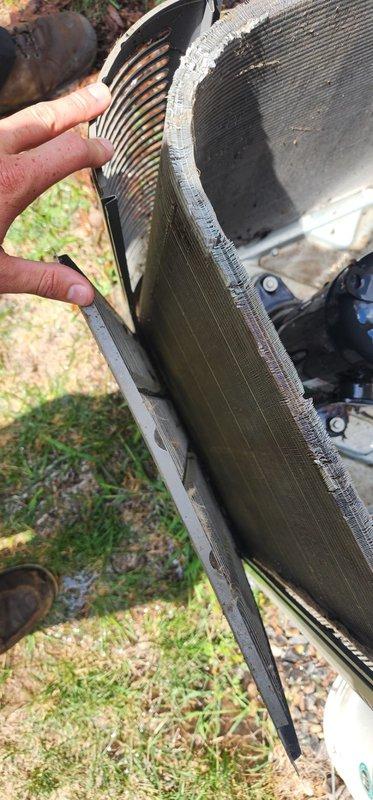Completed scheduled cooling system maintenance and tune-up on properly functioning HVAC unit. Replaced heavily soiled air filter that was severely clogged with accumulated dust and debris throughout pleated media. Inspected blower assembly and internal components, documenting equipment condition with photos for maintenance records.