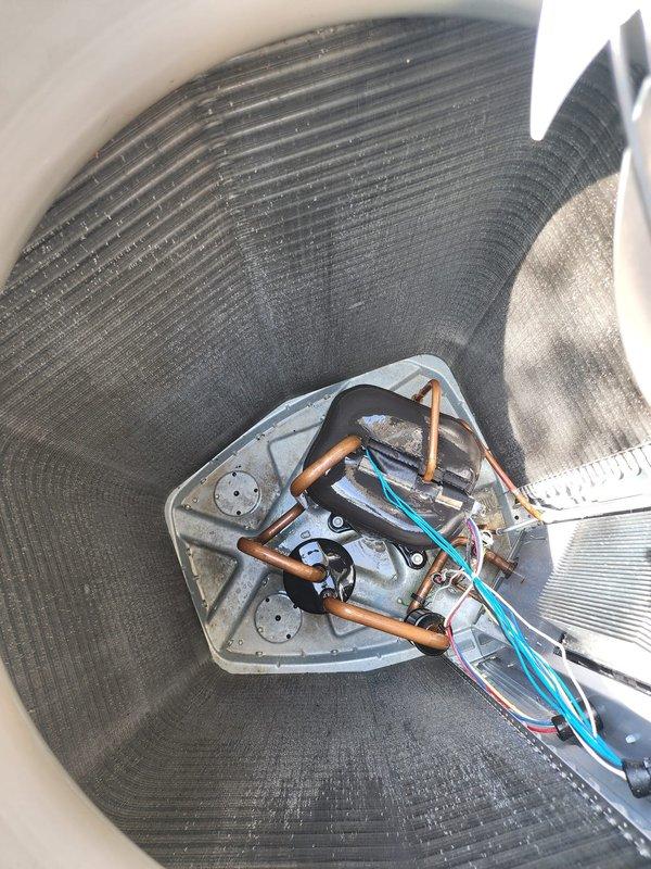 Completed annual preventative maintenance inspection on 3-year-old residential air conditioning system. Performed comprehensive tune-up including visual inspection of outdoor condenser unit, verification of proper refrigerant levels via copper line assessment, examination of electrical connections and wiring, and evaluation of internal components including compressor assembly. Unit found in good operational condition with no deficiencies noted. All components functioning within normal parameters.