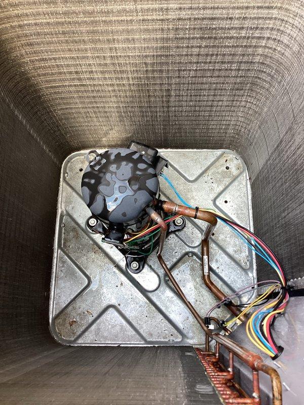 Completed comprehensive AC tune-up and preventative maintenance on residential air conditioning system. Performed standard inspection of outdoor condenser unit including cleaning of aluminum coil fins, verification of refrigerant levels through copper line set, inspection of compressor motor operation, and electrical connection assessment. All components found operating within normal parameters with no deficiencies noted at time of service.