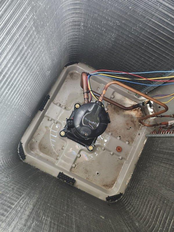 Completed scheduled AC tune-up maintenance on residential split system. Performed comprehensive inspection of outdoor condenser unit, verified operational status of all components, and checked refrigerant levels. Inspected indoor evaporator coil assembly, drain pan, and condensate pump system; noted standing water with normal sediment accumulation in drain pan and confirmed pump is functioning properly with all electrical connections secure.